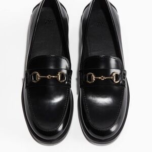 H&M Shiny Black Loafers with Gold Accent